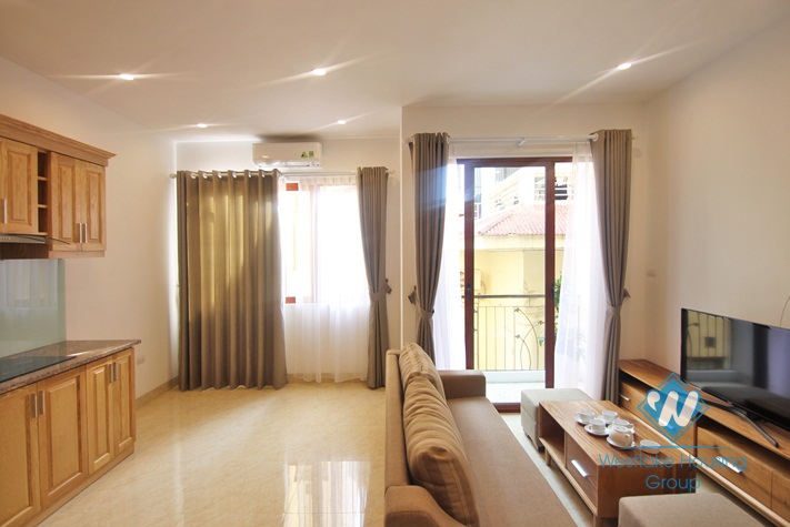 Lovely 01 bedroom apartment with small balcony for rent in To Ngoc Van street